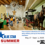 A family walks in a gallery with a windmill and model of a horse drawn wagon