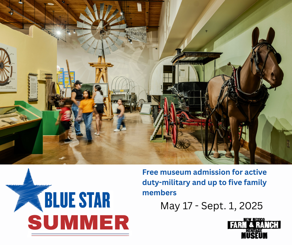 A family walks in a gallery with a windmill and model of a horse drawn wagon